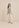 Gilet Adeline Lavender Print met Top Hania cream en Broek Kavi sand, voorkant