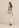 Gilet Adeline Lavender Print met Top Hania cream en Broek Kavi sand, achterkant