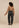 Top Nour Beige met Broek Kove zwart, achterkant