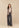 Gilet Aliza Grey met Broek Kela antraciet en Top Hania cream, voorkant